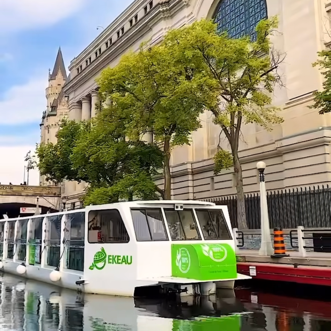 the 100 Percent Electric UNESCO Canal Cruise boat on the rideau canal in Ottawa