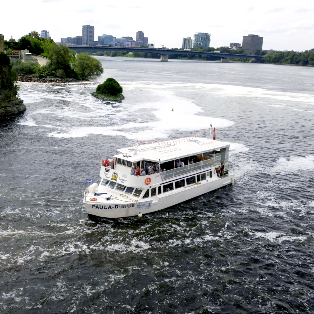 Father's Day Brunch Cruise bird's eye view of the paul D river cruise boat near the rideau falls