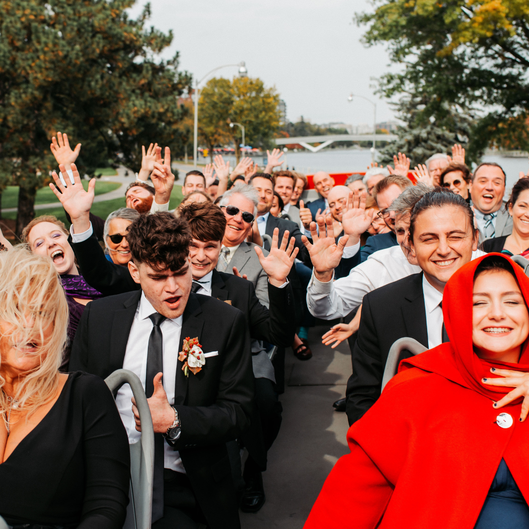 Ottawa City Bus Tour 1 Day with excited passengers enjoying their experience on the top deck of the bus.
