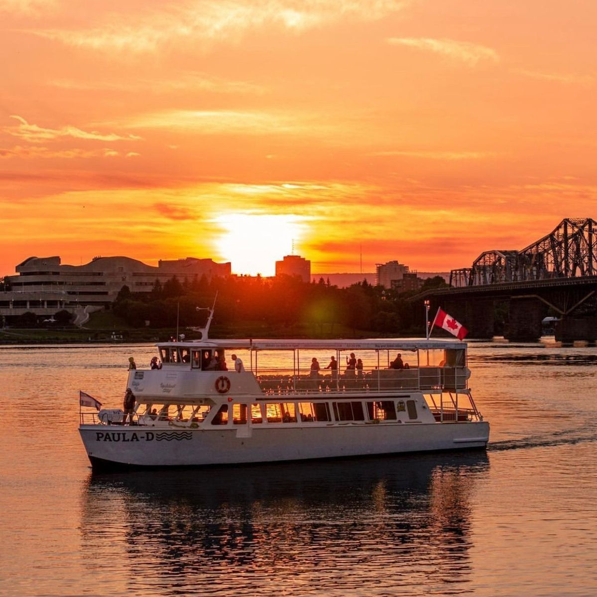 Signature River Cruise Yoga Cruise Ottawa boat during sunset on the water for the Sunrise Yoga & Meditation Cruise.